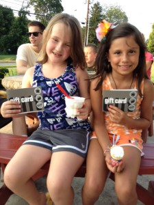 DeAnna Eaton, left, and Gabby delPielago enjoy ice cream at the June event.