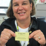 Kristin Marquis, York Suburban High School secretary, displays a Golden Pass.
