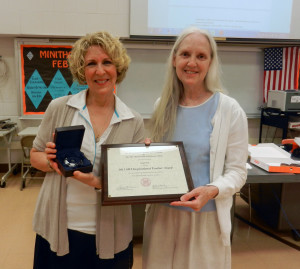 York Suburban High School science teacher Leigh Foy (left) is presented with her MIT award by Lucie Wilkens, Director of the MIT Club of the Delaware Valley.