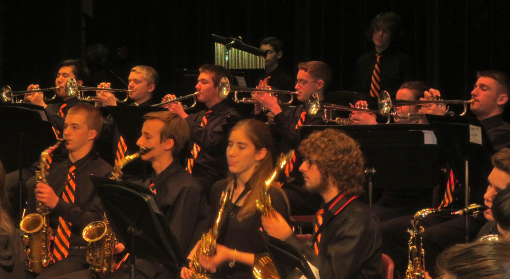 The sounds of brass playing holiday music at the York Suburban High School concert.