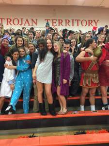 York Suburban student section says, "Cheese!" for the camera at a pajama themed basketball game. 
